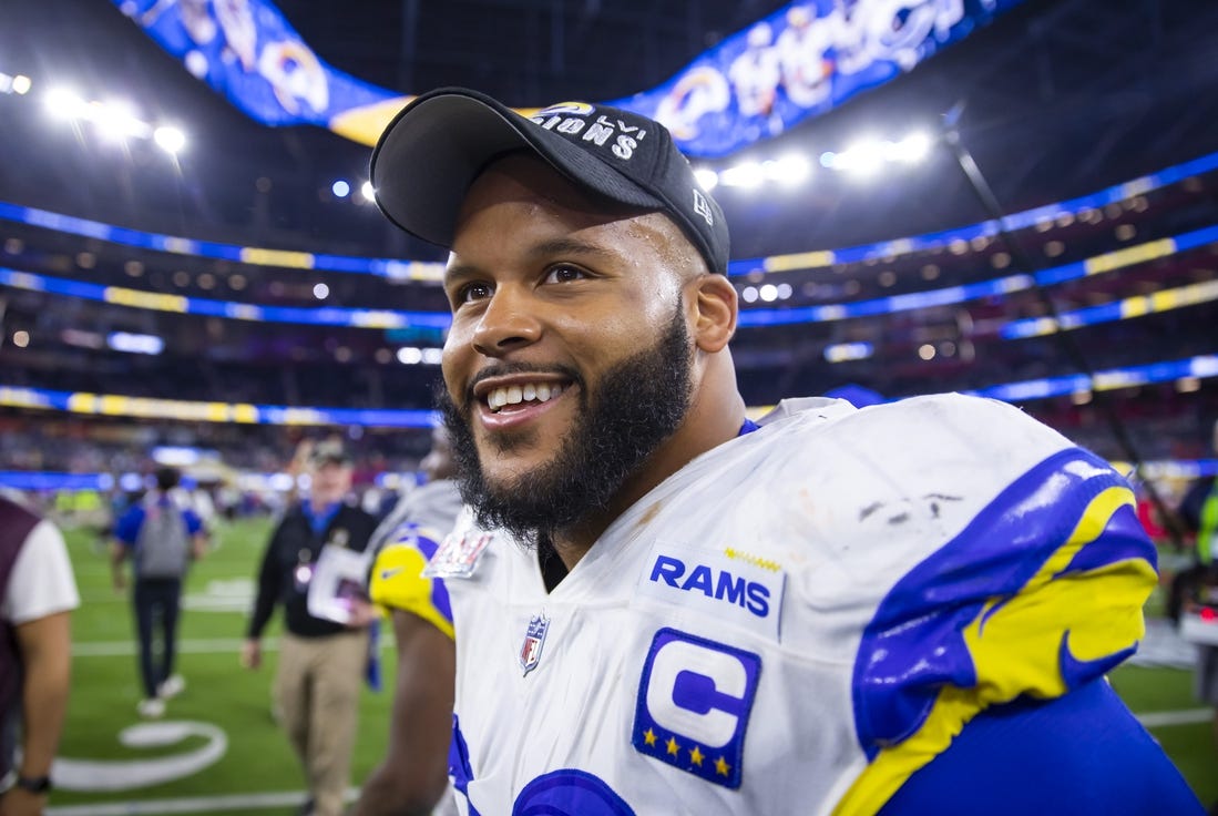 Feb 13, 2022; Inglewood, CA, USA; Los Angeles Rams defensive tackle Aaron Donald (99) celebrates after defeating the Cincinnati Bengals during Super Bowl LVI at SoFi Stadium. Mandatory Credit: Mark J. Rebilas-USA TODAY Sports