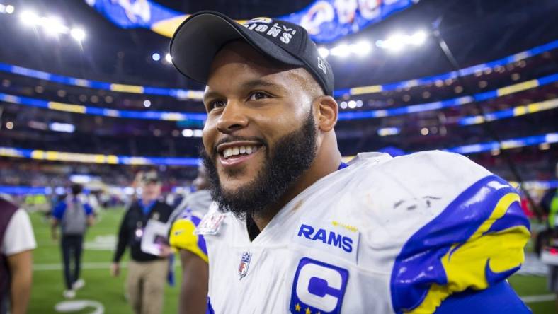 Feb 13, 2022; Inglewood, CA, USA; Los Angeles Rams defensive tackle Aaron Donald (99) celebrates after defeating the Cincinnati Bengals during Super Bowl LVI at SoFi Stadium. Mandatory Credit: Mark J. Rebilas-USA TODAY Sports