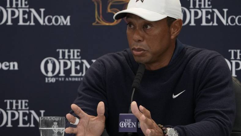 Jul 12, 2022; St. Andrews, Fife, SCT; Tiger Woods talks with the media during a press conference prior to the 150th Open Championship golf tournament at St. Andrews Old Course. Mandatory Credit: Michael Madrid-USA TODAY Sports