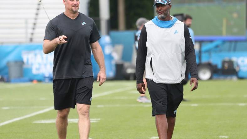 Detroit Lions GM Brad Holmes and head coach Dan Campbell walk off the field after practice Thursday, July 28, 2022 at the Allen Park practice facility.

Lions1