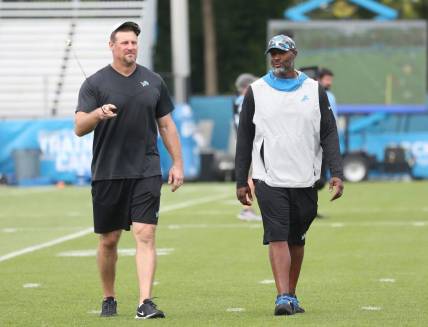 Detroit Lions GM Brad Holmes and head coach Dan Campbell walk off the field after practice Thursday, July 28, 2022 at the Allen Park practice facility.

Lions1