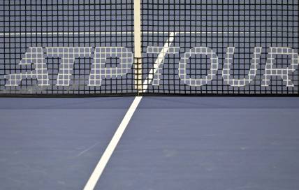 Aug 9, 2022; Montreal, QC, Canada; General view of the net and ATP Tour logo in first round play in the National Bank Open at IGA Stadium. Mandatory Credit: Eric Bolte-USA TODAY Sports