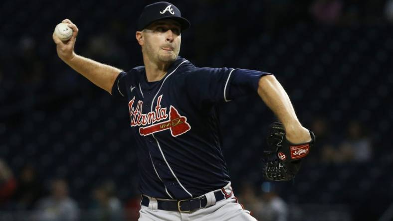 Aug 22, 2022; Pittsburgh, Pennsylvania, USA; Atlanta Braves starting pitcher Jake Odorizzi (12) delivers a pitch against the Pittsburgh Pirates during the first inning at PNC Park. Mandatory Credit: Charles LeClaire-USA TODAY Sports