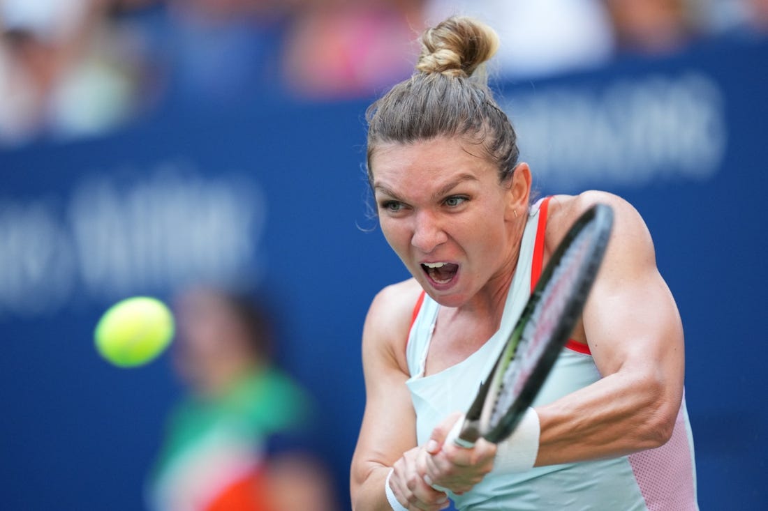 Aug 29, 2022; Flushing, NY, USA; Simona Halep of Romania hits to Daria Snigur of Ukraine on day one of the 2022 U.S. Open tennis tournament at USTA Billie Jean King National Tennis Center. Mandatory Credit: Danielle Parhizkaran-USA TODAY Sports