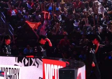 Nov 5, 2022; San Francisco, California, USA; Fans hold lit signs for T1 after game 3 against DRX during the League of Legends World Championships at Chase Center. Mandatory Credit: Kelley L Cox-USA TODAY Sports