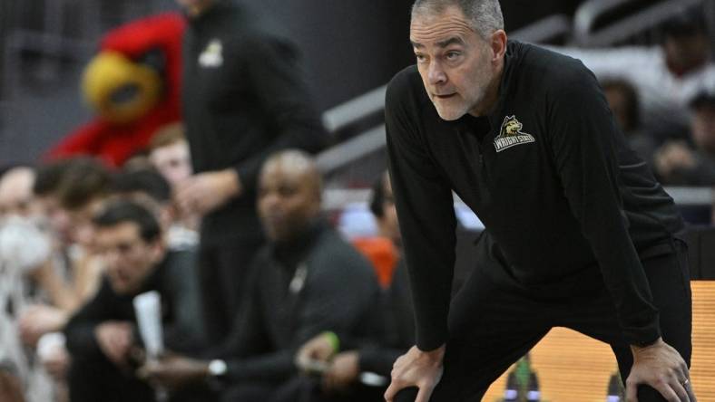 Nov 12, 2022; Louisville, Kentucky, USA;  Wright State Raiders head coach Scott Nagy watches from the sideline during the second half against the Louisville Cardinals at KFC Yum! Center. Wright State defeated Louisville 73-72. Mandatory Credit: Jamie Rhodes-USA TODAY Sports