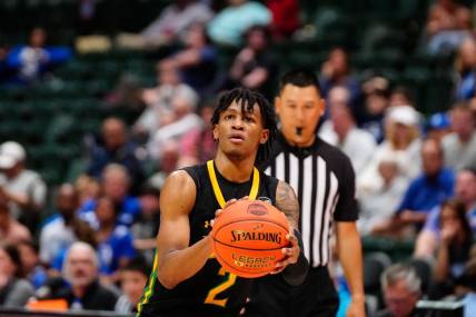 Nov 27, 2022; Orlando, FL, USA; Siena Saints guard Javian McCollum (2) shoots against the Seton Hall Pirates during the second half at ESPN Wide World of Sports. Mandatory Credit: Rich Storry-USA TODAY Sports