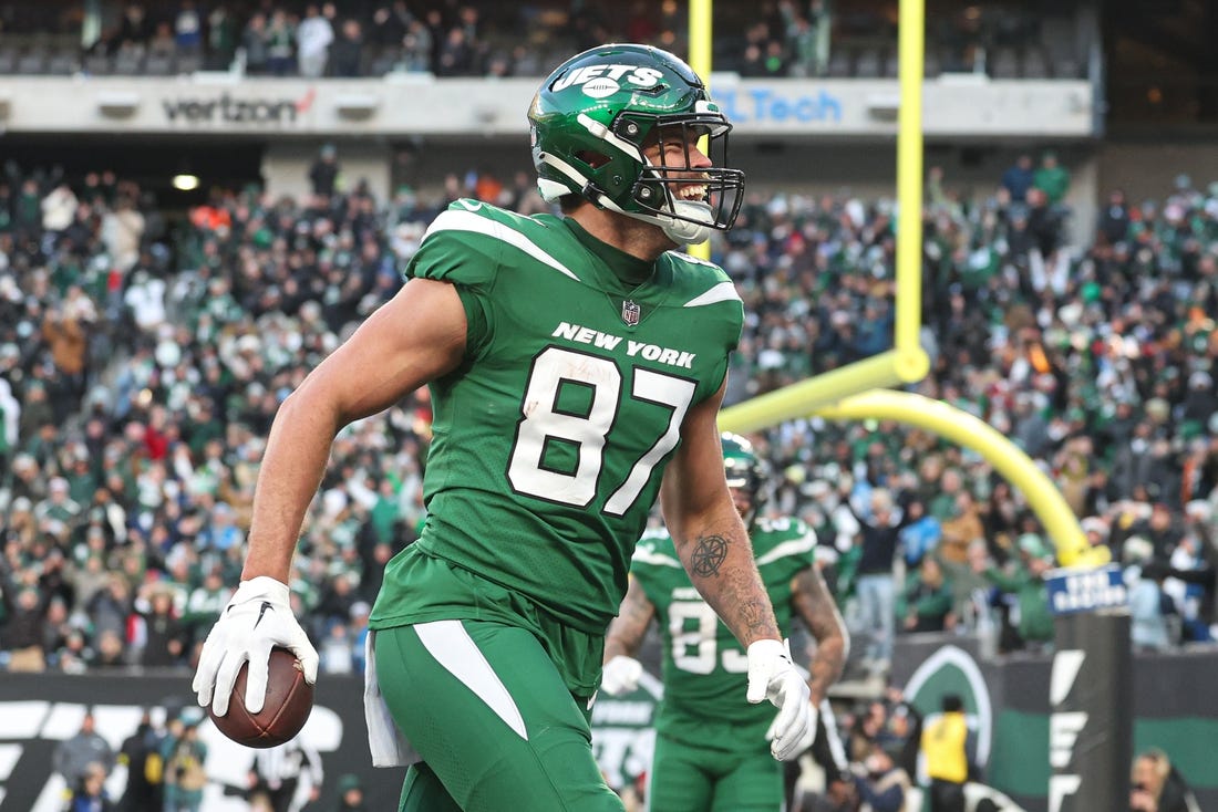 New York Jets tight end C.J. Uzomah (87) celebrates his touchdown reception against the Detroit Lions during the second half at MetLife Stadium. Mandatory Credit: Vincent Carchietta-USA TODAY Sports