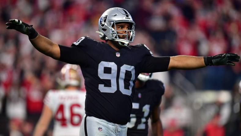 January 1, 2023; Paradise, Nevada, USA; Las Vegas Raiders defensive tackle Jerry Tillery (90) reacts after San Francisco 49ers place kicker Robbie Gould (9) misses a field goal during the second half at Allegiant Stadium. Mandatory Credit: Gary A. Vasquez-USA TODAY Sports