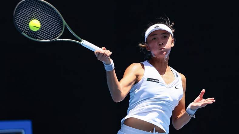 Jan 16, 2023; Melbourne, VICTORIA, Australia; Yue Yuan (China) returns the ball against Maria Sakkari (Greece) (not pictured) at Melbourne Park. Mandatory Credit: Mike Frey-USA TODAY Sports