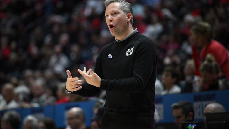 Jan 25, 2023; San Diego, California, USA; Utah State Aggies head coach Ryan Odom gestures from the sideline during the first half against the San Diego State Aztecs at Viejas Arena. Mandatory Credit: Orlando Ramirez-USA TODAY Sports