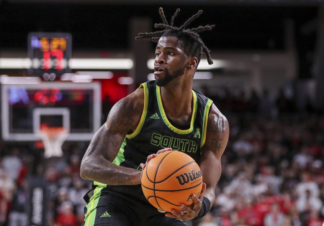 Feb 11, 2023; Cincinnati, Ohio, USA; South Florida Bulls guard Selton Miguel (1) holds the ball against the Cincinnati Bearcats in the second half at Fifth Third Arena. Mandatory Credit: Katie Stratman-USA TODAY Sports