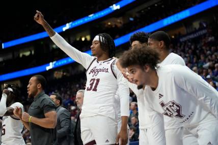 Texas A&M forward Javonte Brown (31) reacts on the bench after a teammate was fouled by an Arkansas player during the second half of a quarterfinal SEC Men   s Basketball Tournament game at Bridgestone Arena Friday, March 10, 2023, in Nashville, Tenn.

Sec Basketball Arkansas Vs Texas A M