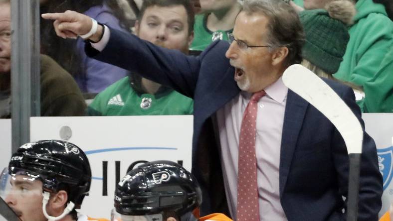 Mar 11, 2023; Pittsburgh, Pennsylvania, USA; Philadelphia Flyers head coach John Tortorella  reacts on the bench against the Pittsburgh Penguins during the third period at PPG Paints Arena.  Pittsburgh won 5-1. Mandatory Credit: Charles LeClaire-USA TODAY Sports