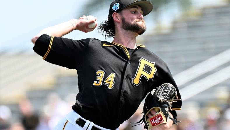 Mar 5, 2023; Bradenton, Florida, USA; Pittsburgh Pirates pitcher JT Brubaker (34) throws a pitch in the first inning of a spring training game against the Minnesota Twins at LECOM Park. Mandatory Credit: Jonathan Dyer-USA TODAY Sports
