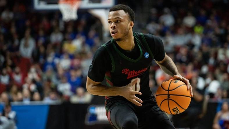 Howard's Marcus Dockery brings the ball down the court during the NCAA men's basketball tournament first round match-up between Kansas and Howard, on Thursday, March 16, 2023, at Wells Fargo Arena, in Des Moines, Iowa.

0316 Kansas Howard 017 Arw