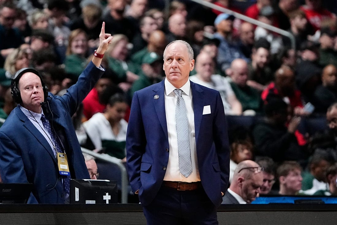 Vermont Catamounts head coach John Becker looks off with concern during the first round of the NCAA men's basketball tournament against the Marquette Golden Eagles at Nationwide Arena.

Syndication The Columbus Dispatch