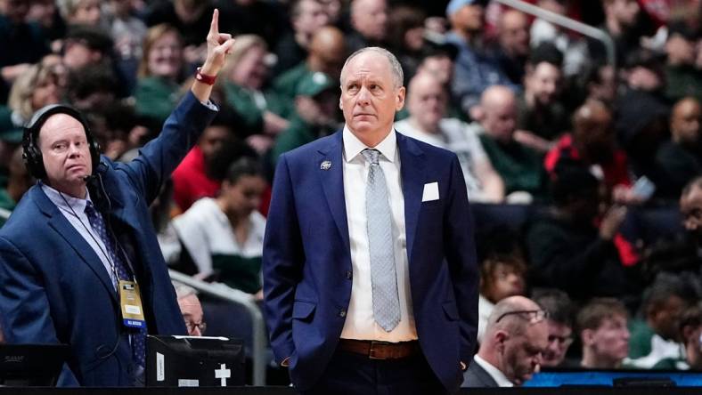 Vermont Catamounts head coach John Becker looks off with concern during the first round of the NCAA men's basketball tournament against the Marquette Golden Eagles at Nationwide Arena.

Syndication The Columbus Dispatch