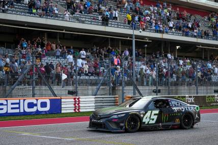 Monster Energy Toyota driver Tyler Reddick (45) drives past the grandsand crowd after winning the NASCAR EchoPark Automotive Grand Prix at the Circuit of the Americas on Sunday, Mar. 26, 2023 in Austin.

Aem Nascar Day 3 33