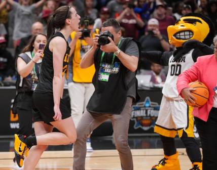 Iowa guard Caitlin Clark (22) celebrates a win over South Carolina during the 2023 NCAA Women's Final Four.