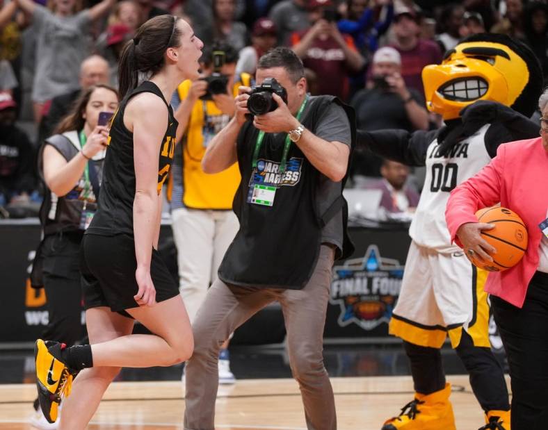 Iowa guard Caitlin Clark (22) celebrates a win over South Carolina during the 2023 NCAA Women's Final Four.