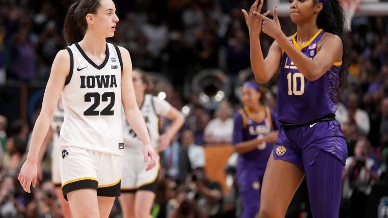 LSU forward Angel Reese (10) shows Iowa guard Caitlin Clark (22) her ring finger during final seconds of the NCAA Women's National Championship basketball game in Dallas, Sunday, April 2, 2023.

Hawks20 Jpg