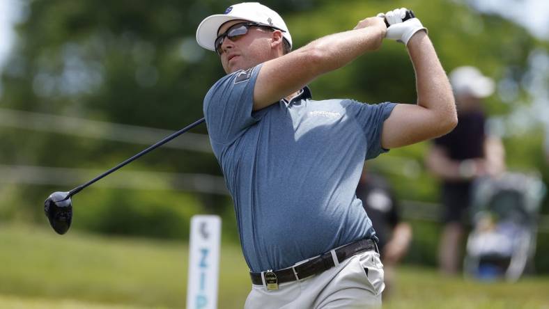 May 27, 2023; Potomac Falls, Virginia, USA; Andy Ogletree hits his tee shot on the second hole during the second round of LIV Golf Washington, D.C. golf tournament at Trump National. Mandatory Credit: Geoff Burke-USA TODAY Sports