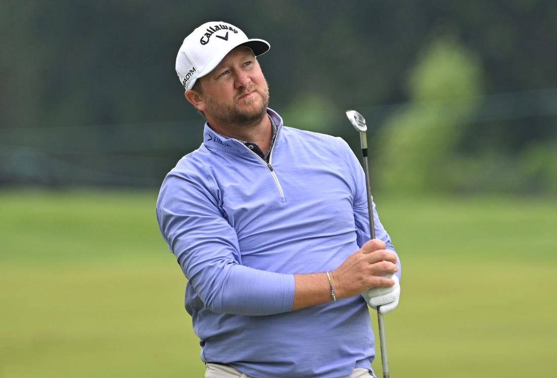 Jun 8, 2023; Toronto, ON, CAN;   Brice Garnett watches a shot from the fairway on the seventh hole during the first round of the RBC Canadian Open golf tournament. Mandatory Credit: Dan Hamilton-USA TODAY Sports