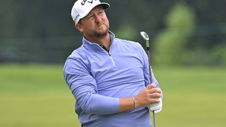 Jun 8, 2023; Toronto, ON, CAN;   Brice Garnett watches a shot from the fairway on the seventh hole during the first round of the RBC Canadian Open golf tournament. Mandatory Credit: Dan Hamilton-USA TODAY Sports