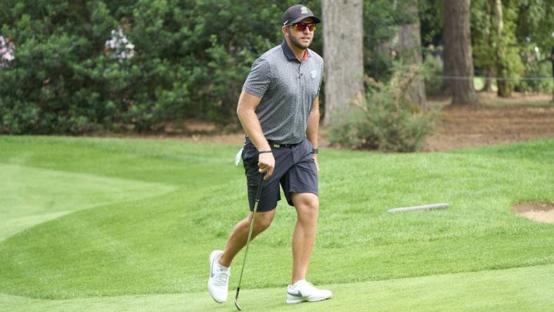 Jul 8, 2023; Hertfordshire, England, GBR; Dean Burmester (ZAF) approaches the 3rd green during the second round of the LIV Golf London golf tournament at Centurion Club. Mandatory Credit: Peter van den Berg-USA TODAY Sports