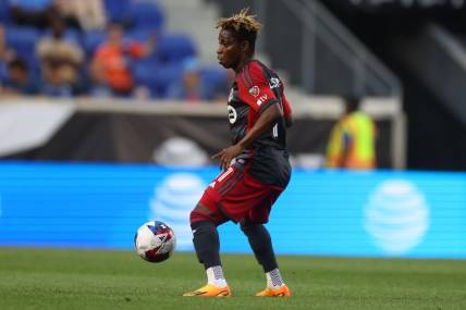 Jul 26, 2023; Harrison, NJ, USA; Toronto FC midfielder Latif Blessing (11) controls the ball against New York City FC during the first half at Red Bull Arena. Mandatory Credit: Vincent Carchietta-USA TODAY Sports