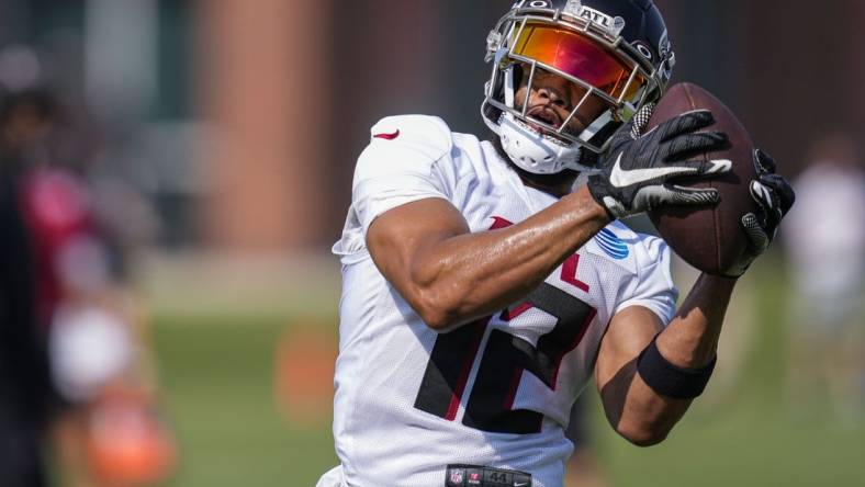 Jul 28, 2023; Flowery Branch, GA, USA; Atlanta Falcons wide receiver KhaDarel Hodge (12) catches a pass during training camp at IBM Performance Field. Mandatory Credit: Dale Zanine-USA TODAY Sports