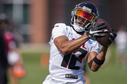 Jul 28, 2023; Flowery Branch, GA, USA; Atlanta Falcons wide receiver KhaDarel Hodge (12) catches a pass during training camp at IBM Performance Field. Mandatory Credit: Dale Zanine-USA TODAY Sports