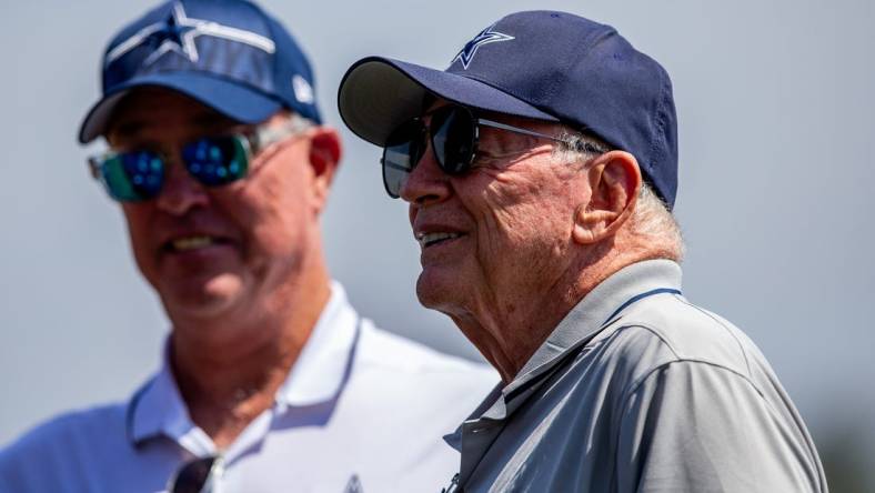 Jul 31, 2023; Oxnard, CA, USA; Dallas Cowboys owner Jerry Jones and chief operating officer Stephen Jones (left) during training camp at the Marriott Residence Inn-River Ridge playing fields. Mandatory Credit: Jason Parkhurst-USA TODAY Sports