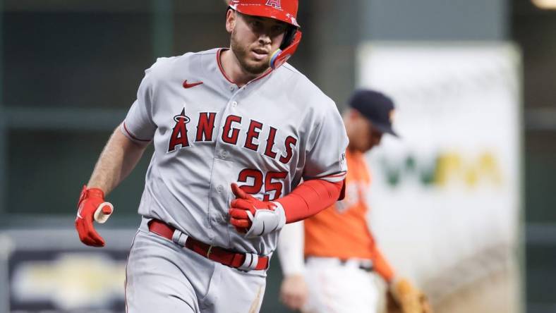 Aug 11, 2023; Houston, Texas, USA; Los Angeles Angels first baseman C.J. Cron (25) rounds the bases after hitting a home run against Houston Astros starting pitcher Justin Verlander (35) (not pictured) in the second inning at Minute Maid Park. Mandatory Credit: Thomas Shea-USA TODAY Sports