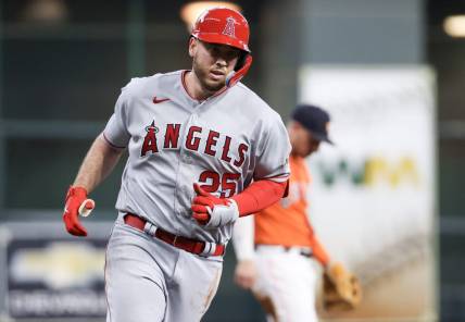 Aug 11, 2023; Houston, Texas, USA; Los Angeles Angels first baseman C.J. Cron (25) rounds the bases after hitting a home run against Houston Astros starting pitcher Justin Verlander (35) (not pictured) in the second inning at Minute Maid Park. Mandatory Credit: Thomas Shea-USA TODAY Sports