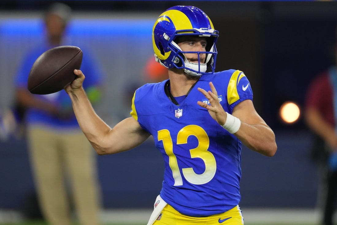 Aug 12, 2023; Inglewood, California, USA; Los Angeles Rams quarterback Stetson Bennett (13) throws the ball in the second half against the Los Angeles Chargers at SoFi Stadium. Mandatory Credit: Kirby Lee-USA TODAY Sports