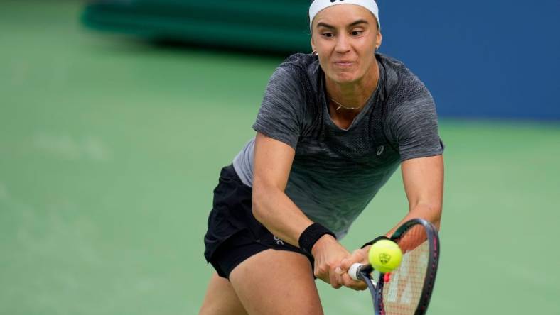 Anhelina Kalinina returns a shot in the third set of the Round of 32 match between Ons Jaebeur (TUN) and Anhelina Kalinina (Ukraine) in the Western & Southern Open at the Lindner Family Tennis Center in Mason, Ohio, on Tuesday, Aug. 15, 2023. Jaebeur won the match, 6-3, 6-7, 7-6.