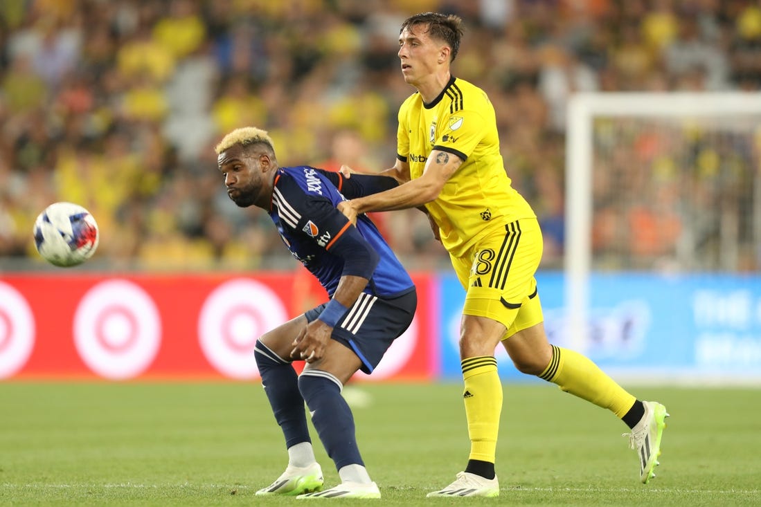 Aug 20, 2023; Columbus, Ohio, USA; Minnesota United forward Luis Amarilla (9) fights for the ball against Columbus Crew Defender Malte Amundsen (18) at Lower.com Field. Mandatory Credit: Joseph Maiorana-USA TODAY Sports