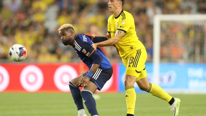 Aug 20, 2023; Columbus, Ohio, USA; Minnesota United forward Luis Amarilla (9) fights for the ball against Columbus Crew Defender Malte Amundsen (18) at Lower.com Field. Mandatory Credit: Joseph Maiorana-USA TODAY Sports