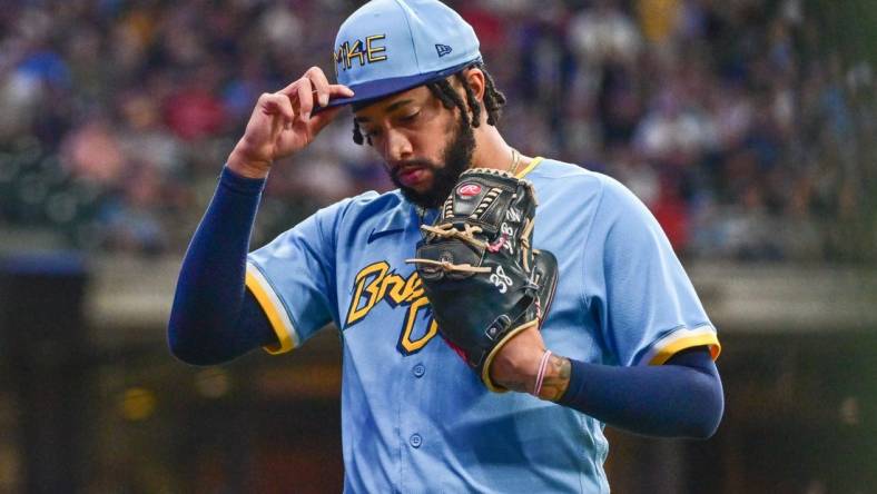 Sep 1, 2023; Milwaukee, Wisconsin, USA; Milwaukee Brewers pitcher Devin Williams (38) walks off the mound after a blown save in the eighth inning against the Philadelphia Phillies at American Family Field. Mandatory Credit: Benny Sieu-USA TODAY Sports