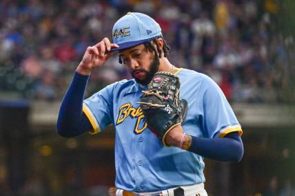 Sep 1, 2023; Milwaukee, Wisconsin, USA; Milwaukee Brewers pitcher Devin Williams (38) walks off the mound after a blown save in the eighth inning against the Philadelphia Phillies at American Family Field. Mandatory Credit: Benny Sieu-USA TODAY Sports