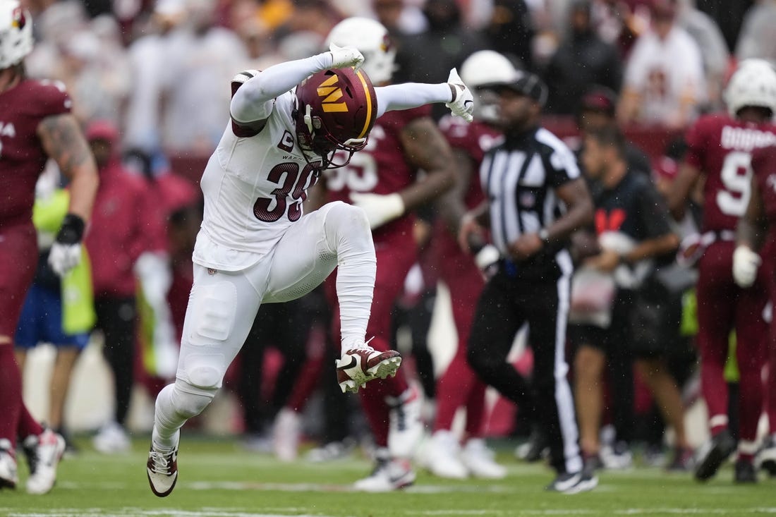 Sep 10, 2023; Landover, Maryland, USA; Washington Commanders safety Jeremy Reaves (39) reacts after a play in the second half against the Arizona Cardinals at FedExField. Mandatory Credit: Brent Skeen-USA TODAY Sports