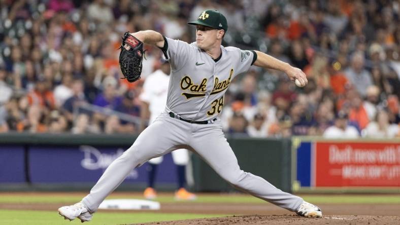 Sep 12, 2023; Houston, Texas, USA; Oakland Athletics starting pitcher JP Sears (38) pitches against the Houston Astros in the first inning at Minute Maid Park. Mandatory Credit: Thomas Shea-USA TODAY Sports