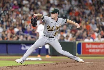Sep 12, 2023; Houston, Texas, USA; Oakland Athletics starting pitcher JP Sears (38) pitches against the Houston Astros in the first inning at Minute Maid Park. Mandatory Credit: Thomas Shea-USA TODAY Sports
