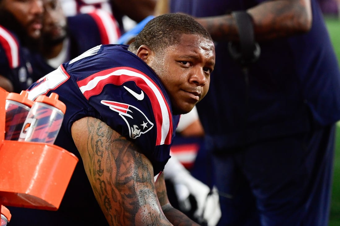 Sep 10, 2023; Foxborough, Massachusetts, USA; New England Patriots offensive tackle Trent Brown (77) sits on the bench during the second half against the Philadelphia Eagles at Gillette Stadium. Mandatory Credit: Eric Canha-USA TODAY Sports