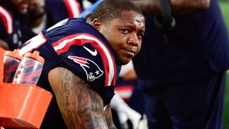 Sep 10, 2023; Foxborough, Massachusetts, USA; New England Patriots offensive tackle Trent Brown (77) sits on the bench during the second half against the Philadelphia Eagles at Gillette Stadium. Mandatory Credit: Eric Canha-USA TODAY Sports