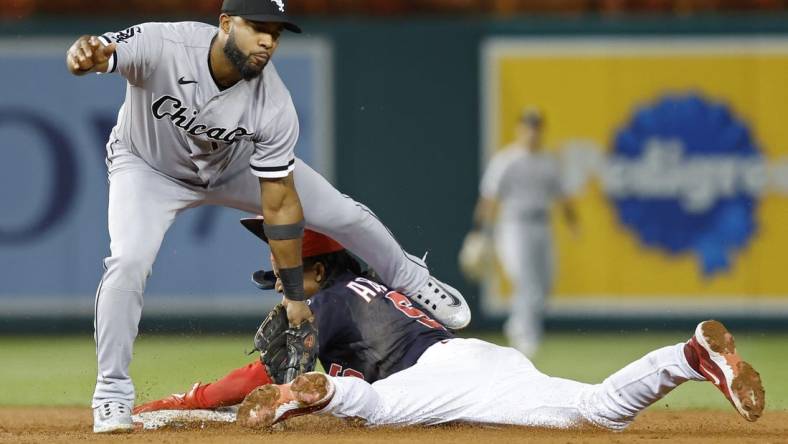 Sep 18, 2023; Washington, District of Columbia, USA; Washington Nationals shortstop CJ Abrams (5) steals second base ahead of a tag by Chicago White Sox shortstop Elvis Andrus (1) during the third inning at Nationals Park. Mandatory Credit: Geoff Burke-USA TODAY Sports