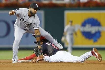 Sep 18, 2023; Washington, District of Columbia, USA; Washington Nationals shortstop CJ Abrams (5) steals second base ahead of a tag by Chicago White Sox shortstop Elvis Andrus (1) during the third inning at Nationals Park. Mandatory Credit: Geoff Burke-USA TODAY Sports