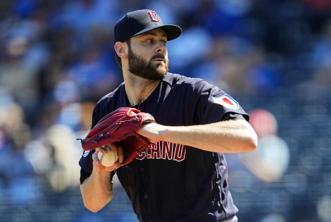 Sep 20, 2023; Kansas City, Missouri, USA; Cleveland Guardians starting pitcher Lucas Giolito (27) pitches during the first inning against the Kansas City Royals at Kauffman Stadium. Mandatory Credit: Jay Biggerstaff-USA TODAY Sports